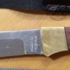 Folding knife with locking clip-point blade, and leather sheath [Used] - Image 7