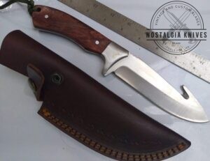 SwissTech 10" Fixed-Blade w/Gut Hook and leather belt sheath.