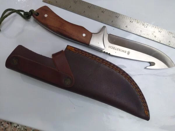 SwissTech 10″ Fixed-Blade w/Gut Hook and leather belt sheath. Fixed-Blade cutlery