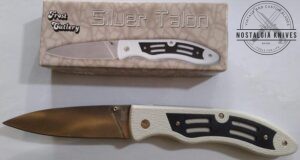 Folding Spear-Point Knife with thumb screw and Liner lock, and belt sheath in orig. packaging [New/Old Stock]