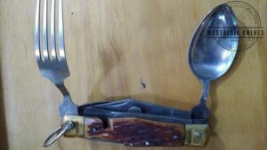 Hobo Camp Knife with Fork, Spoon and 9 other blades.