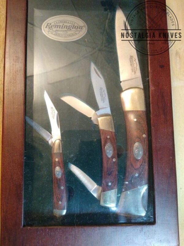 Remington Collector Knife Set – Hunter Single Blade Spine-lock, 3 blade Stockman, 2 blade Jack knife w/ Wood and Brass Handles in Original Wood Display Case[New – Pristine Mint Cond.] Collectible Knives
