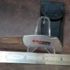 Zippo™ USA 2001 Stainless Steel Lock-Back Pocket Knife w/sheath - Etched 'Starcon International Inc.' on handle[Used-Pristine Cond.] - Image 5