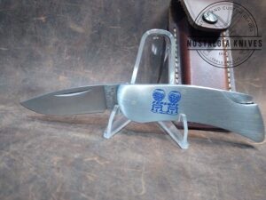 Vintage Zippo - Made by Case 'Fordway gumball' adv. - Lockback knife with orig. leather sheath[Used - Pristine Mint Cond.]